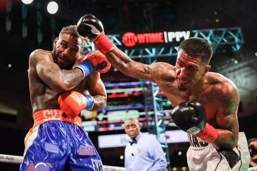 Luis Arias, Malik Warren on Davis-Cruz Card