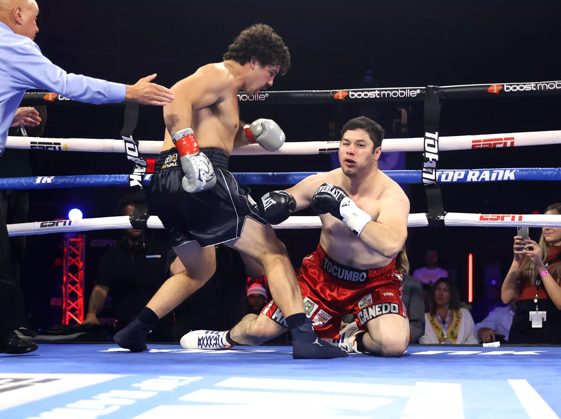 Richard Torrez Jr (L) knocks-down Marco Antonio Canedo (R) during their heavyweight fight at Hard Rock Hotel & Casino Tulsa on August 27, 2022 in Catoosa, Oklahoma.
