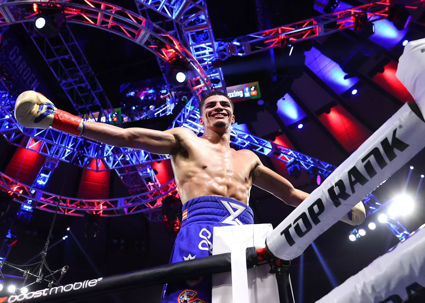 Xander Zayas celebrates after defeating Alexis Salazar, during their super welterweight fight at Madison Square Garden on December 10, 2022 in New York City.