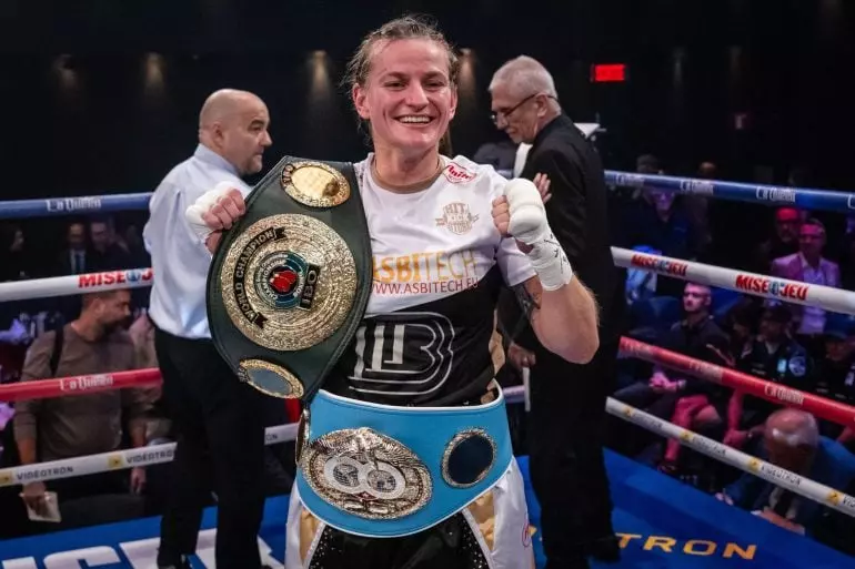 Femke Hermans poses following her win over Mary Spencer