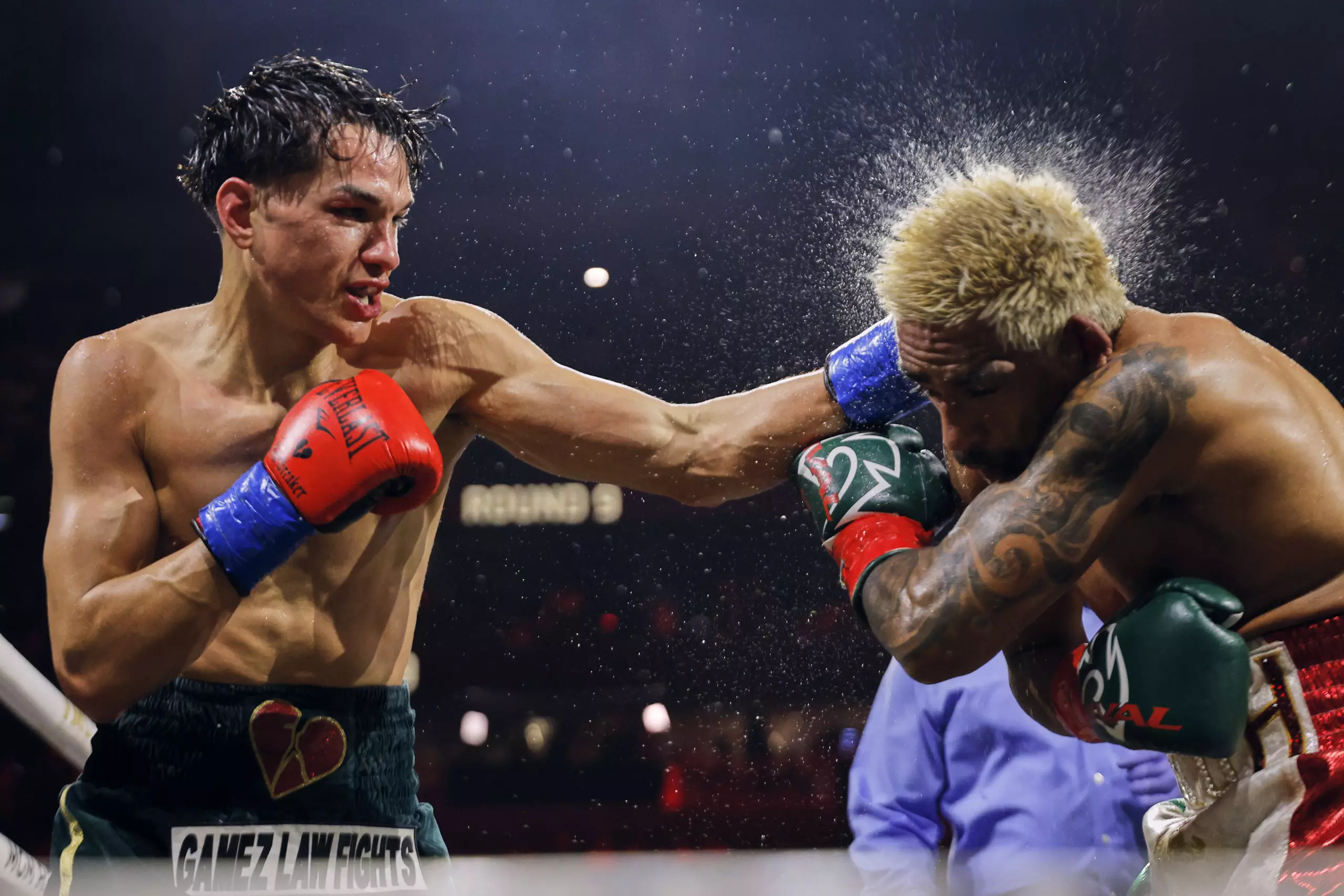 Brandon Figueroa lands left hand vs Jessie Magdaleno