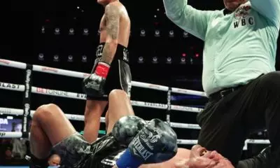 The referee waving off the fight after Jesse Rodriguez stops Juan Francisco Estrada