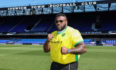Jarrell Miller in a Norwich City football shirt in a promo photo before his fight with Fabio Wardley was cancelled