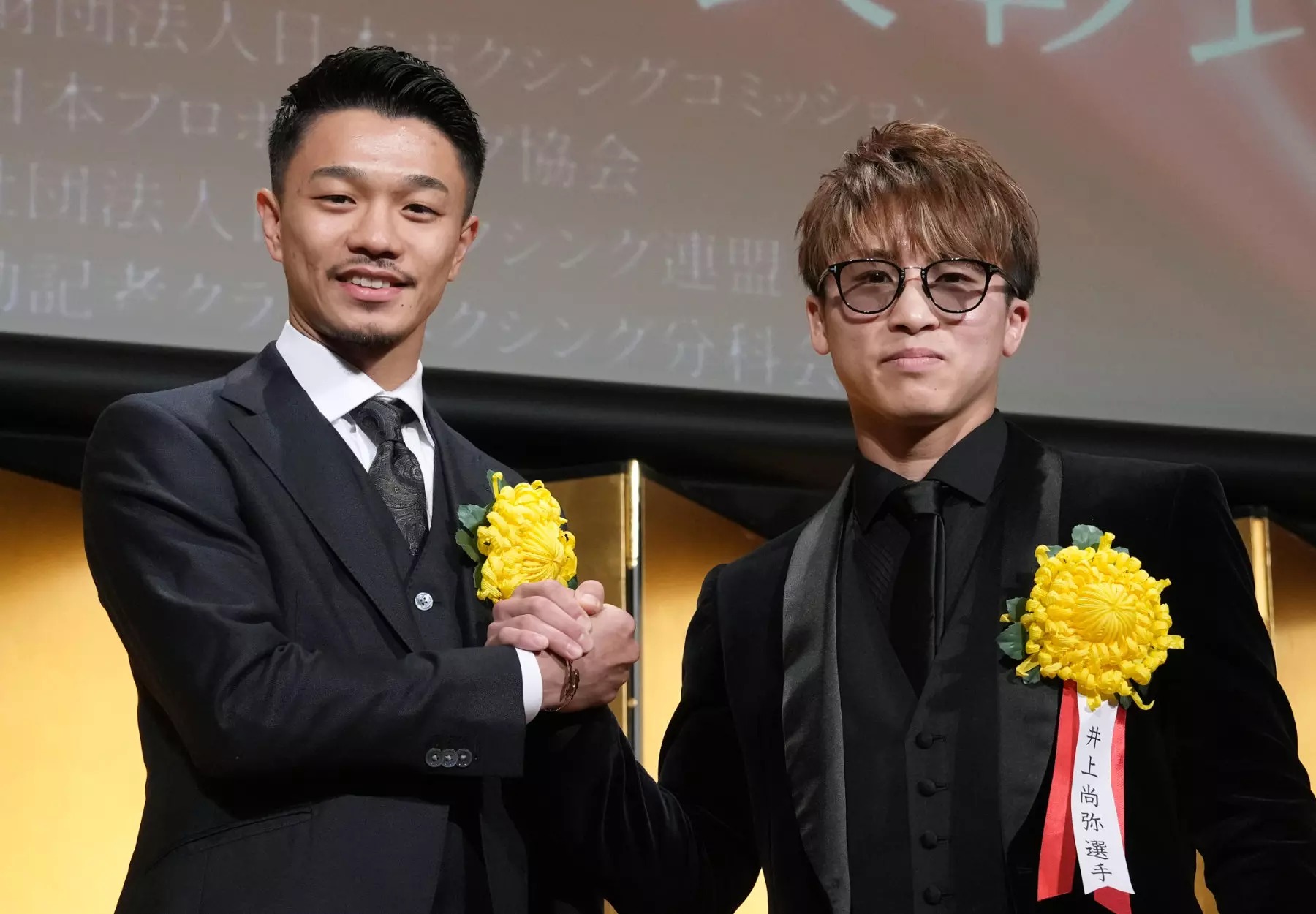 Naoya Inoue vs Junto Nakatani: Naoya Inoue and Junto Nakatani posing together for a photo at a recent event