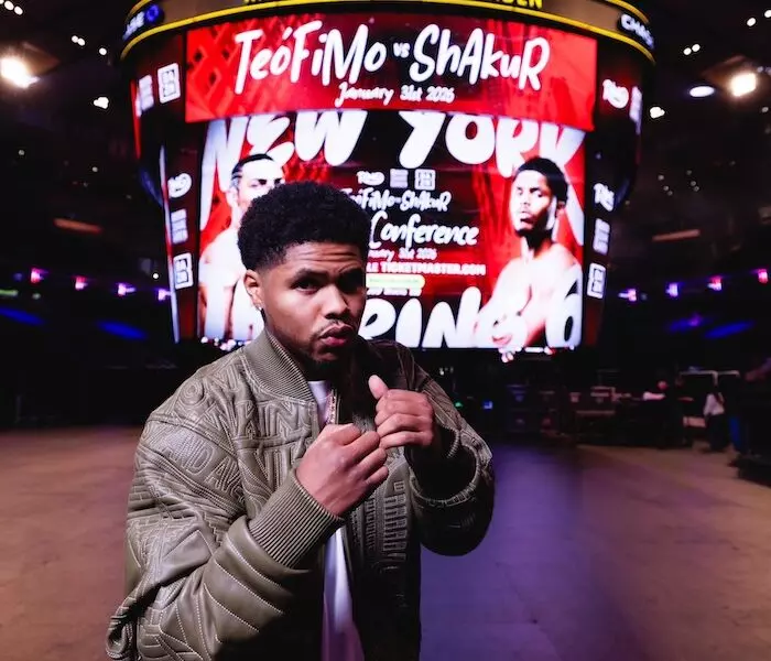 Shakur Stevenson in front of MSG screen advertising Teofimo Lopez fight