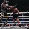 Derek Chisora throwing a right hand against Deontay Wilder