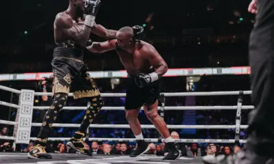 Derek Chisora throwing a right hand against Deontay Wilder