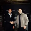 Tom Aspinall and Eddie Hearn, celebrating Aspinall signing to Matchroom talent
