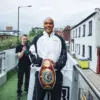 Fabio Wardley holding his WBO heavyweight title at Media day for Daniel Dubois fight.