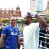 Fabio Wardley looks at the camera as Daniel Dubois stares him down at media day/public workout