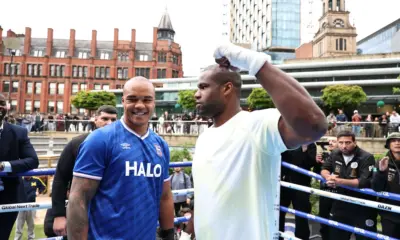 Fabio Wardley looks at the camera as Daniel Dubois stares him down at media day/public workout