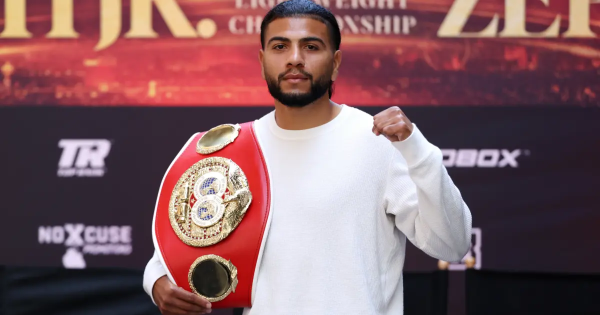Raymond Muratalla holding his IBF belt at the press conference for his fight with Robson Conceicao