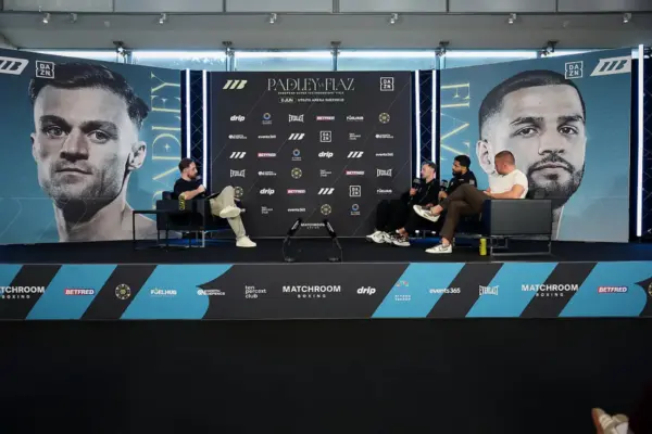 Josh Padley and Aqib Fiaz speaking at a press conference