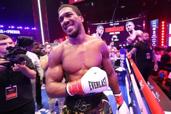 Anthony Joshua smiling after victory against Kristian Prenga