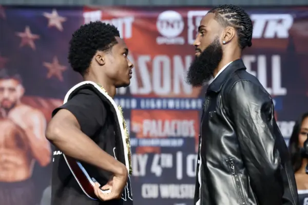 Abdullah Mason and Albert Bell face off at their press conference