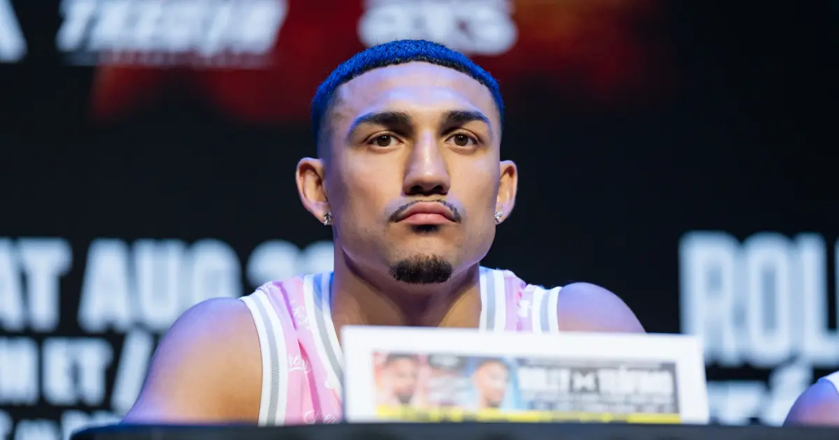 Teófimo López sitting at a press conference