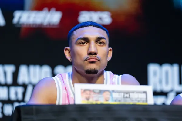 Teófimo López sitting at a press conference