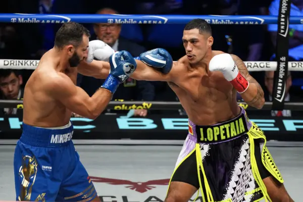Jai Opetaia lands straight right against Noel Mikaelian.