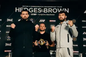 John Hedges and Pat Brown face the cameras