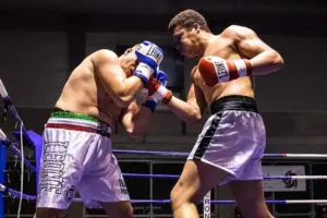 Michael Pirotton lands right uppercut through the guard of opponent