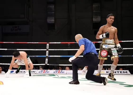 Thanongsak Simsri walks away after knocking down Mark Vicelles