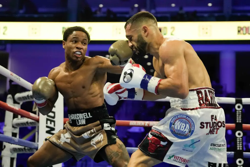 Floyd Schofield lands straight left against Lucas Bahdi